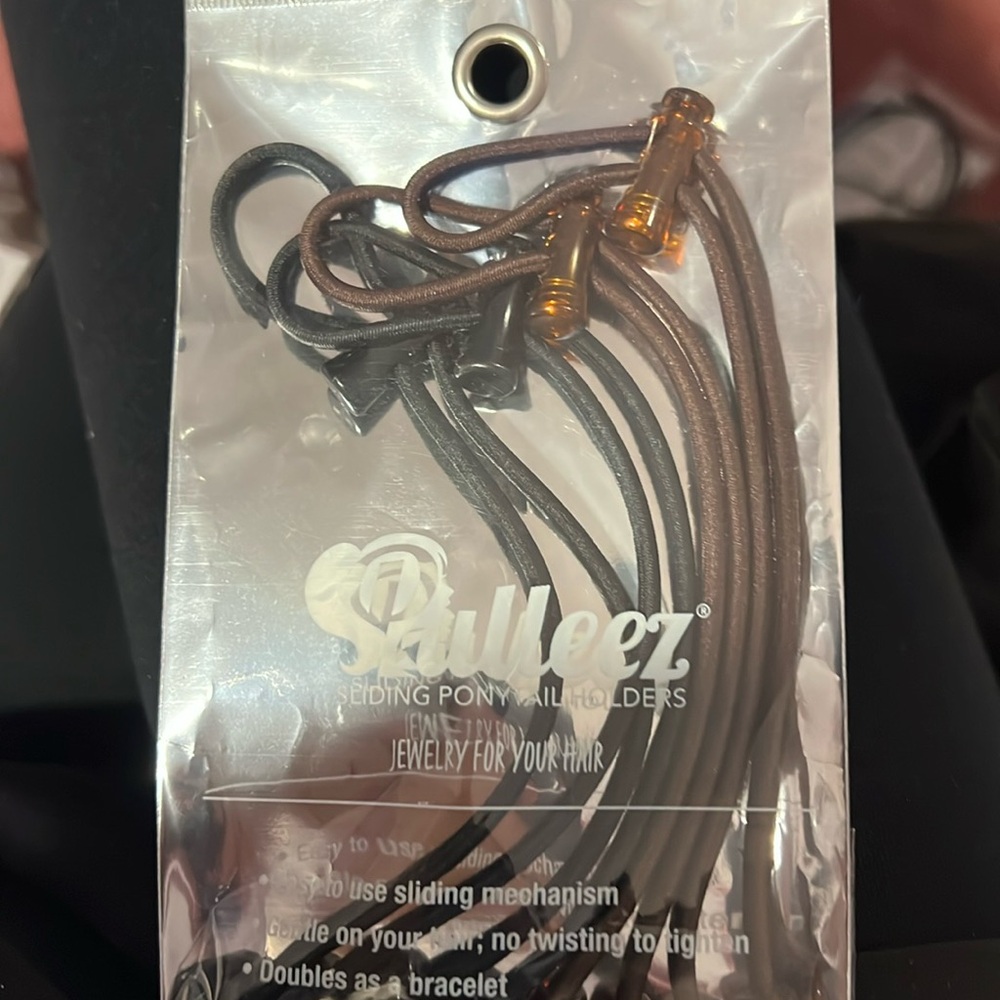 Brand new set of 4 Ponytail holder